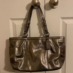 Silver Coach Purse.